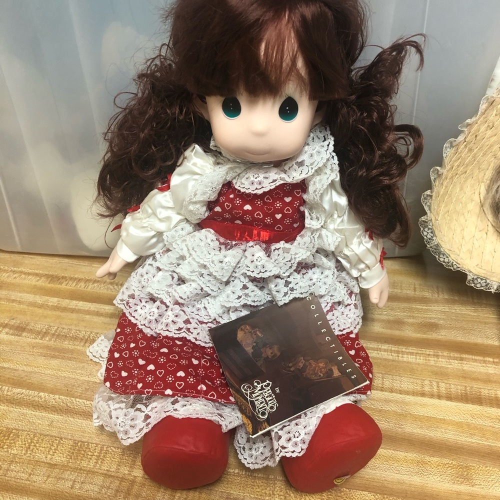 Adorable Doll with Red Dress and Lace